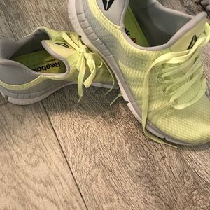 Bright neon Reebok shoes with memory tech soles